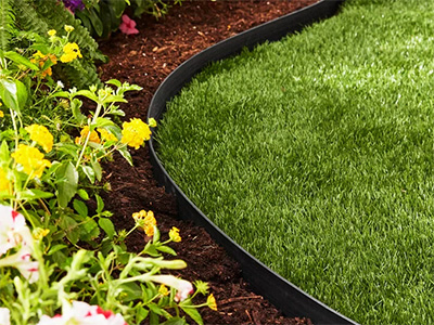 Plastic and stone landscape edging options for lawns, yards, gardens, and more from ZNT Property Services.